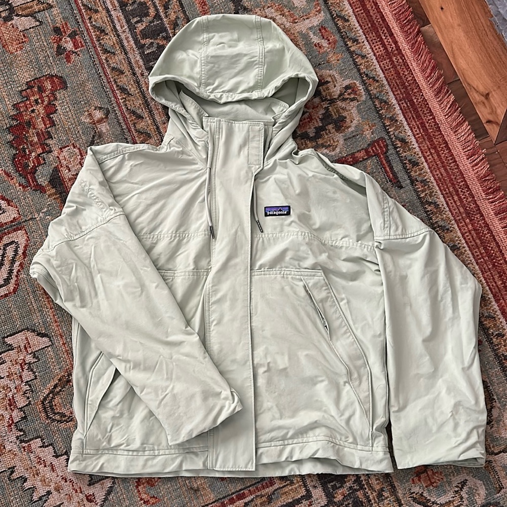 green Patagonia rain coat